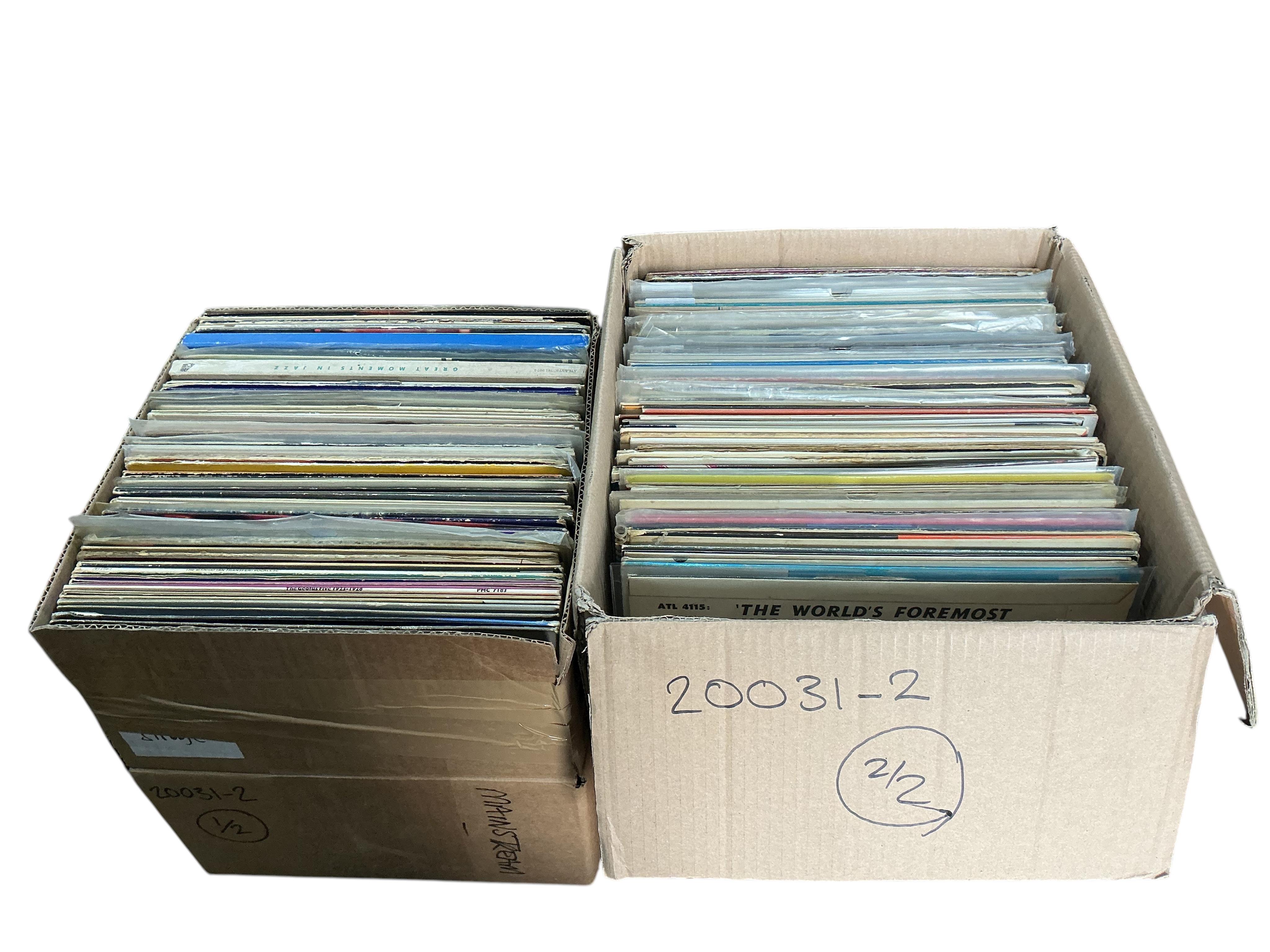 Two boxes of jazz LP record albums, artists including; Bud Shank, Charlie Parker, Rex Stewart, Morrissey Mullen, The Manhattan Transfer, Stefan Grappelli, Earl Bostic, Louis Armstrong, etc.